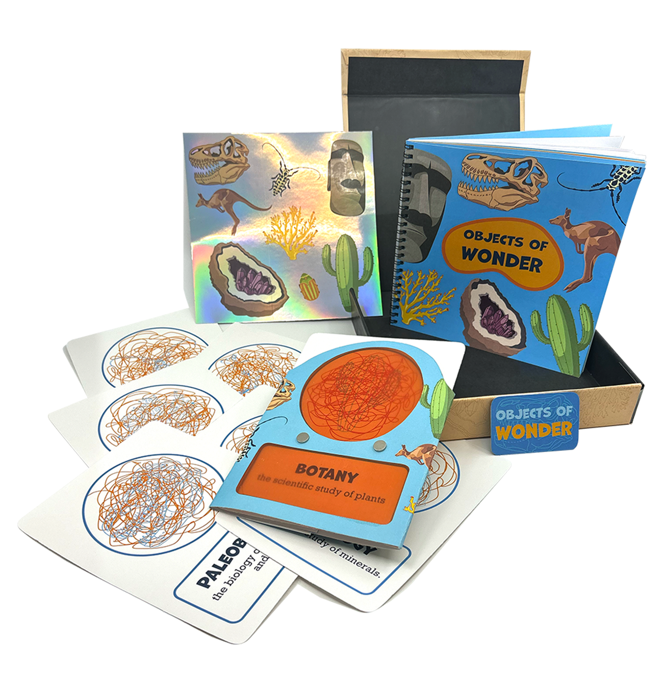 A box full of items related to the SMithsonian Exhibit, Objects of Wonder.